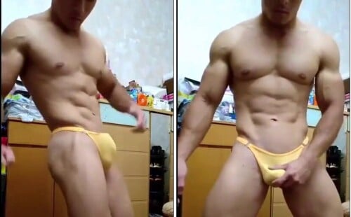 Muscle guy posing with a boner