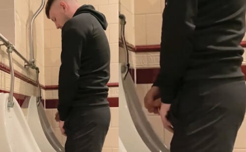 Straight lad in shorts taking a pee at urinals