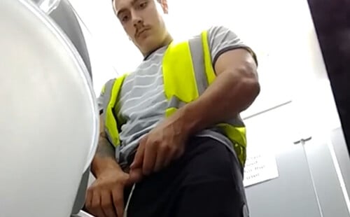 Stud caught peeing in a public toilet