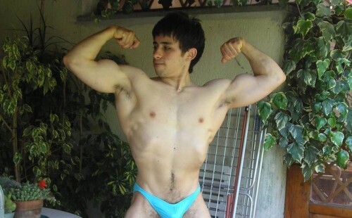 Hung and hairy Italian teen posing in very tight speedos
