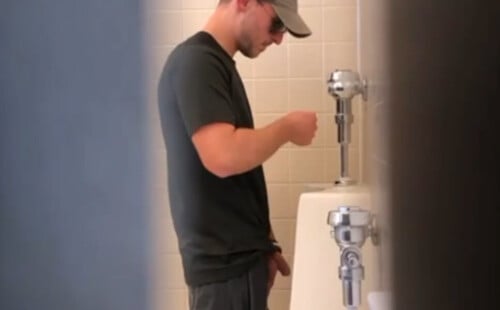 Sexy daddy peeing at urinals