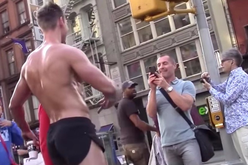 Guy Watching: Nearly Naked Muscle Man Parades Downtown