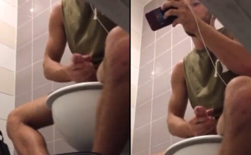 Horny guy caught wanking in public toilet
