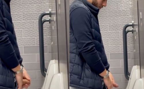 Uncut dude taking a leak at urinals