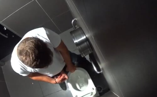 Uncut dude caught peeing in a public restroom