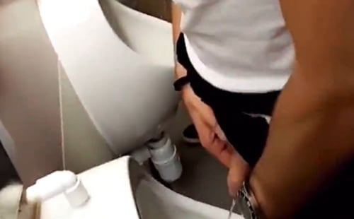 Handsome guy with delicious uncut dick peeing
