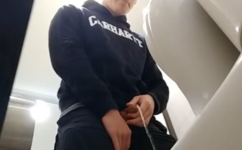 Guy caught peeing in public toilet by spycam