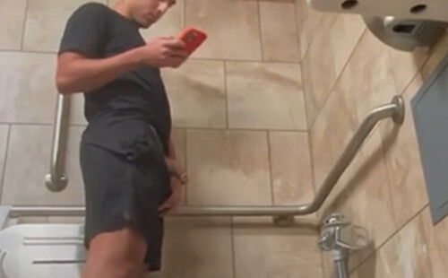 Hung guy caught peeing in public toilet