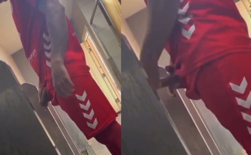 Handsome footballer caught pissing at urinals