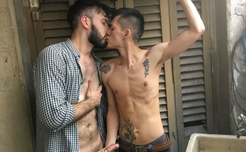 Bearded top fucks a skinny Asian guy