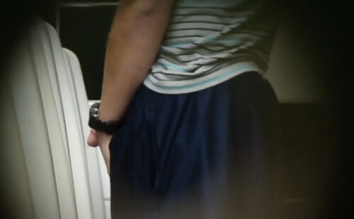 Spycam video featuring a nice dude taking a pee at the urinals