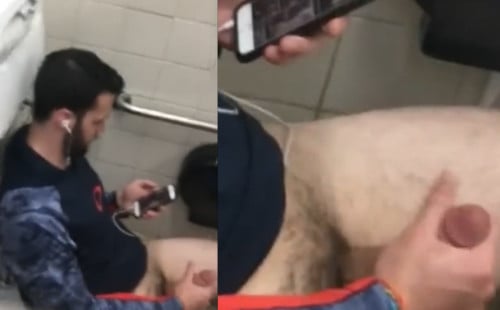 Horny dude caught jerking in public toilet