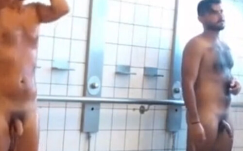 Hot stud showing off his boner while showering