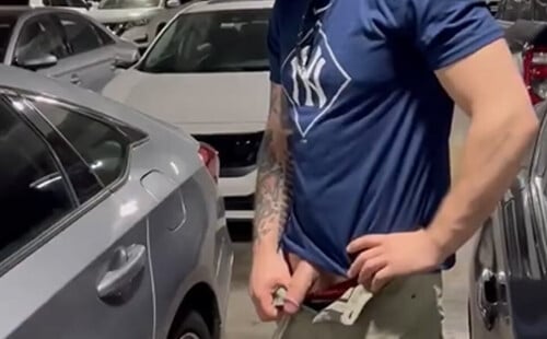 Hung guy pissing in parking lot