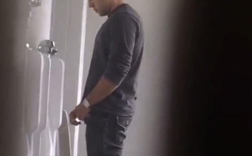 Hot guy peeing at urinals