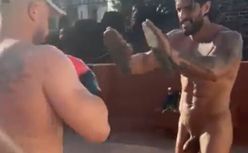 A naked boxing training in public