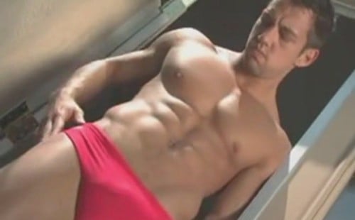Johnny's sexy red speedo makes for a hot poolside jerk-off!