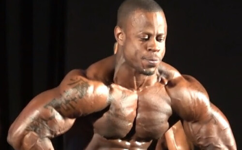 Black bodybuilder accidentally exposing the base of his dick during competition