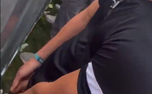 Straight guys pissing in public during music festival