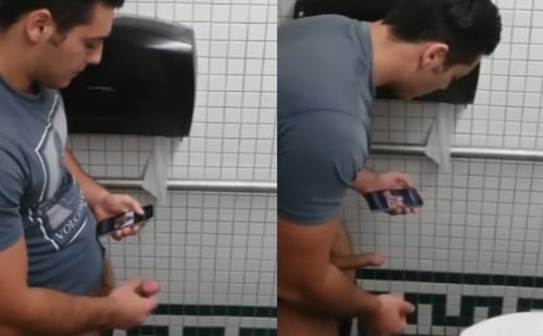 Horny dude caught wanking in public toilet
