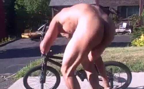 Black guy caught riding a bike naked in public