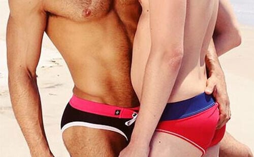 Gay Speedo Couple Kissing