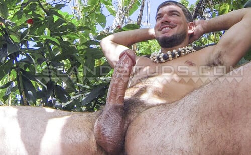 Hung Lumberjack Shows Off His Erection in Grass Skirt