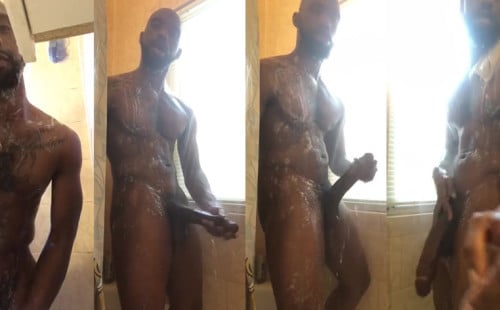 Black guy with huge cock taking a shower and stroking his BB