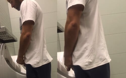 Spy on a hot uncut guy caught taking a piss at the urinals.