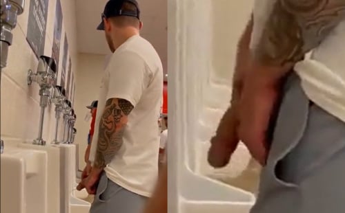 Tattooed guy caught peeing at stadium urinals