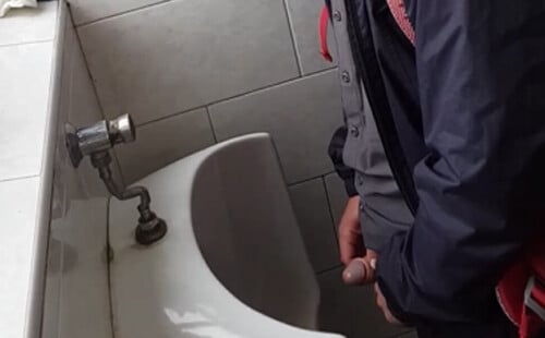 Dutch uncut guy caught peeing at urinals