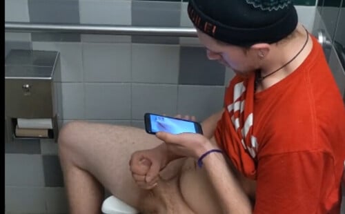 guy caught wanking his cock in public toilet