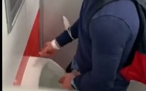 Guy with enourmous cock caught peeing at urinals