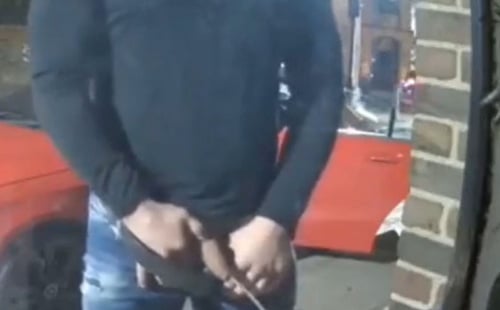 Hung uncut man caught peeing in the street